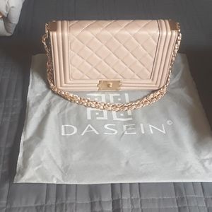 Handbag with dustbag